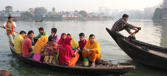  Garment workers commuting by boat to work. Photo credit Bishawjit Das. 